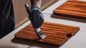 Spirit Yachts | Craftsmanship | Hand Varnishing Yacht | Luke Dorey Photography